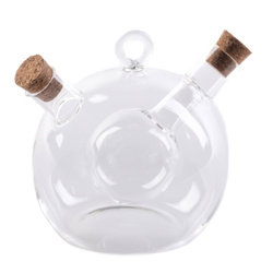 O sticlă în formă de bilă pentru oțet și ulei, un gadget decorativ original și practic de bucătărie