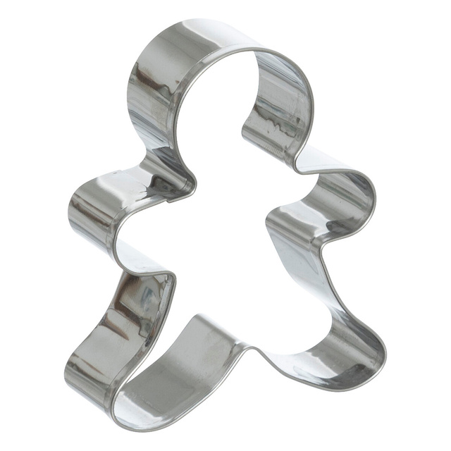 Un set de accesorii pentru copt de Craciun, o forma cu spatula si o forma de silicon