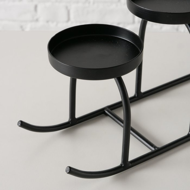 Candelabru metalic în formă de sanie SLIDO