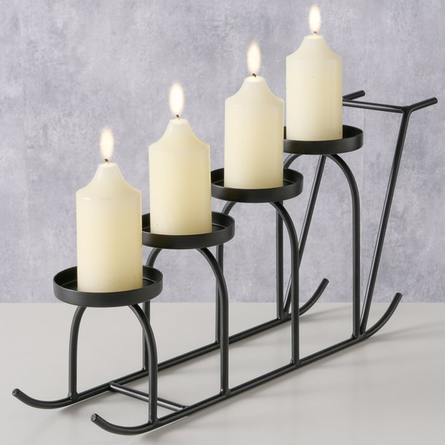 Candelabru metalic în formă de sanie SLIDO