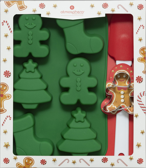 Un set de accesorii pentru copt de Craciun, o forma cu spatula si o forma de silicon