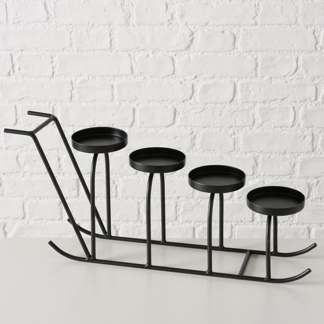 Candelabru metalic în formă de sanie SLIDO