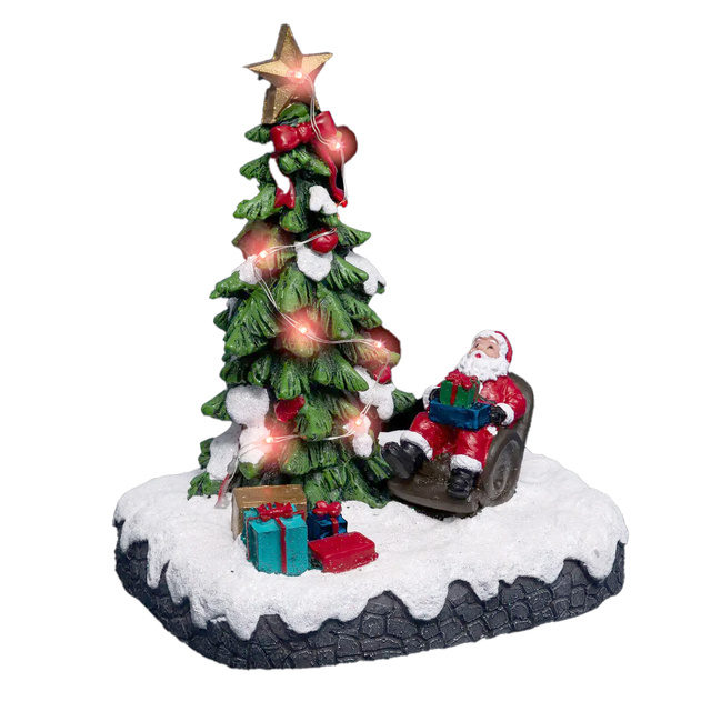 Sat de Crăciun, scenă de Crăciun cu Moș Crăciun sub brad