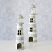 Un set de decoratiuni metalice in forma de faruri SANDS, inaltime 40-57 cm