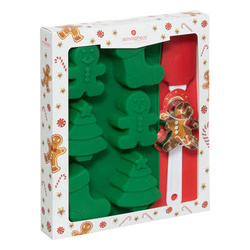 Un set de accesorii pentru copt de Craciun, o forma cu spatula si o forma de silicon