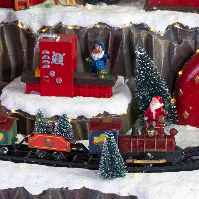 Sat de Crăciun, scenă de Crăciun cu fabrica de cadouri