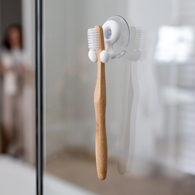 Suport pentru periuțe de dinți TOMMY, fixat cu ventuză, KOZIOL, nisip de deșert reciclat